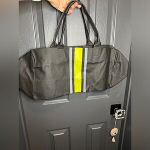 Collapsible travel duffle bag in black. No label and never used​​​​